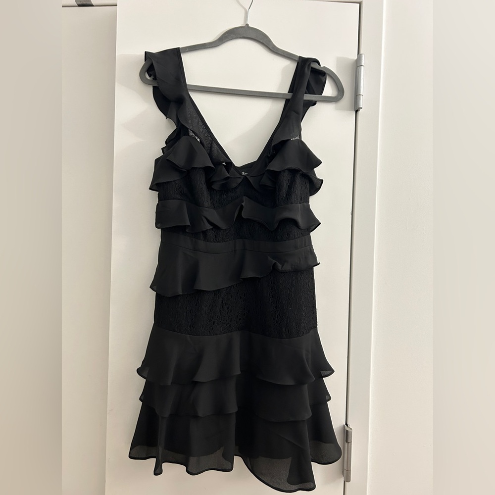 Bardot dress: short flouncy black comfortable and size 8 but is like a size 6